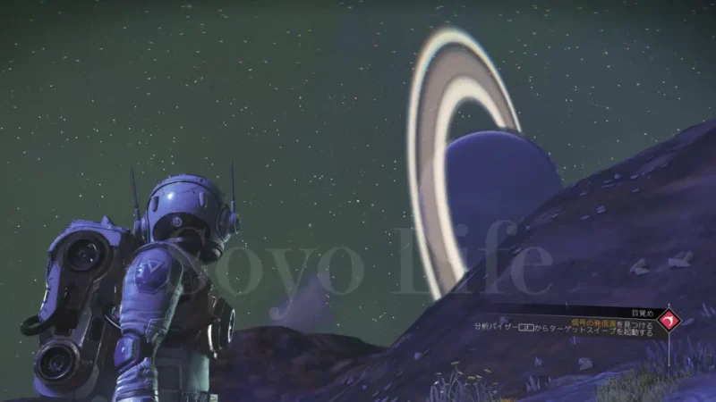 夜の惑星でリング状の巨大惑星を見上げる宇宙探検者の後ろ姿